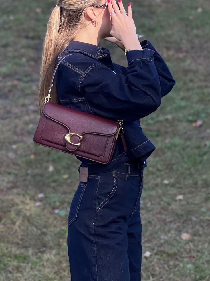 Coach Tabby 26 worn as a shoulder bag with short detachable strap