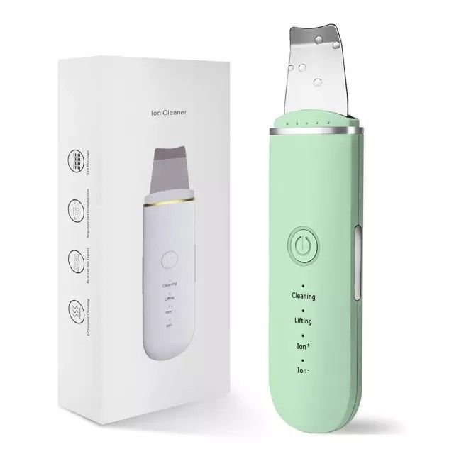 Ultrasonic facial spatula being used on wet skin around the nose and chin Vibration-Skin-Scrubber