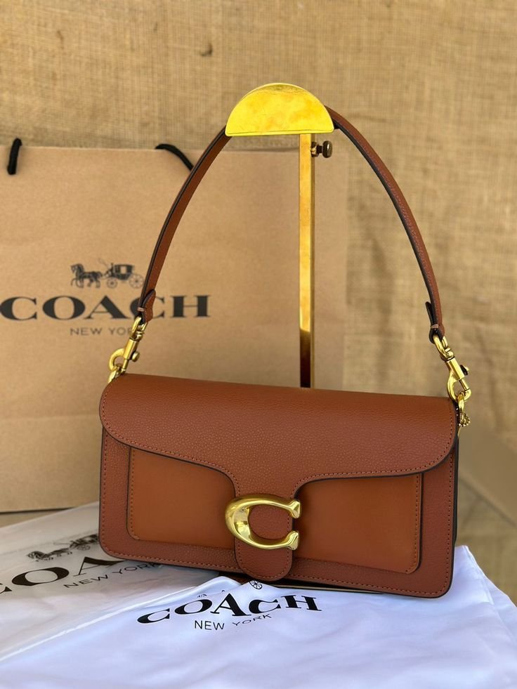 Coach Tabby 26 worn crossbody with detachable long strap