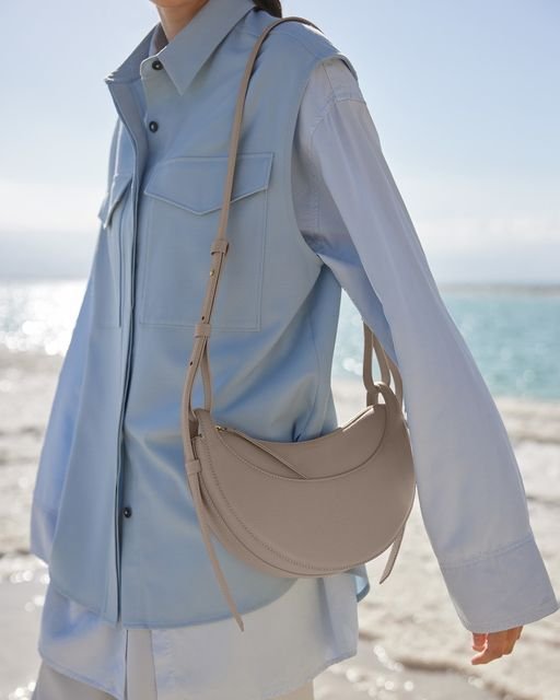 Polène Numéro Dix worn as a crossbody bag